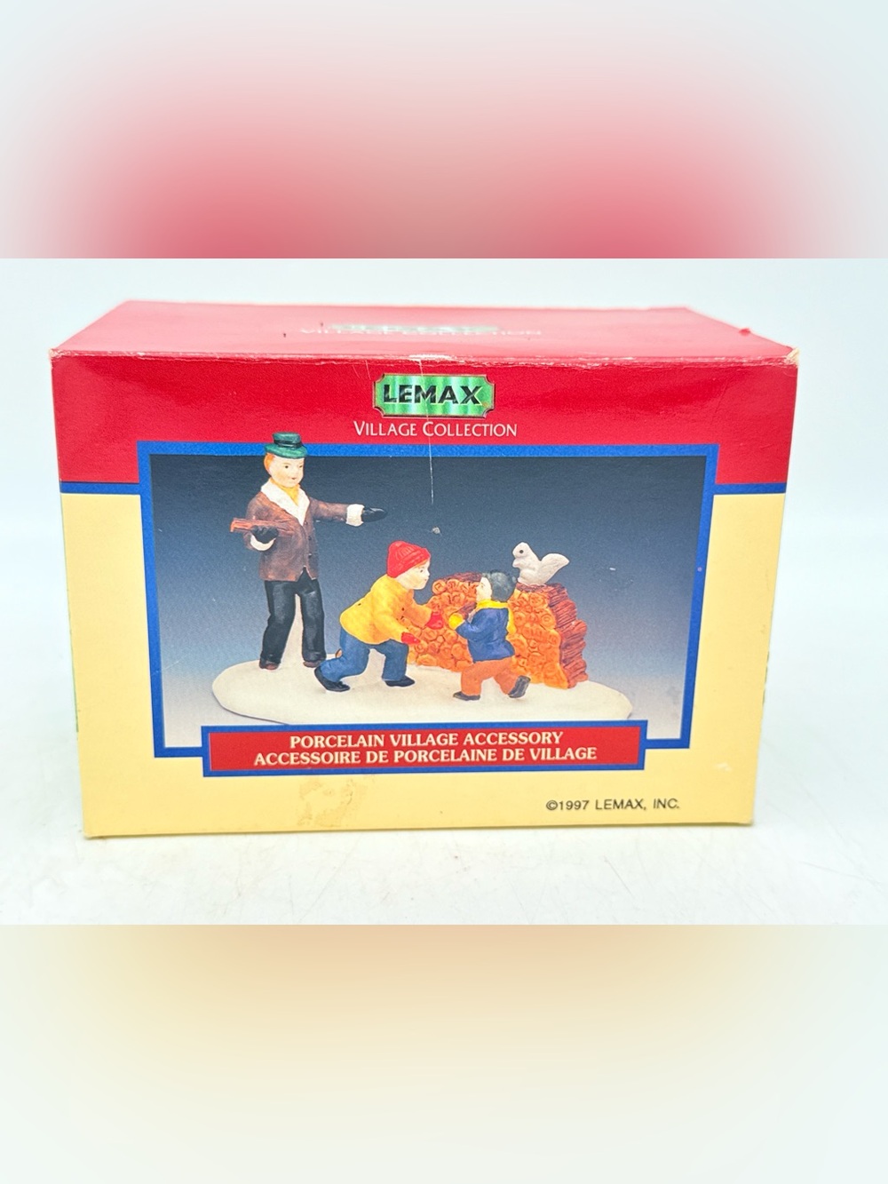 Lemax Village Accessory - Red, Yellow, Blue Children with Log Pile